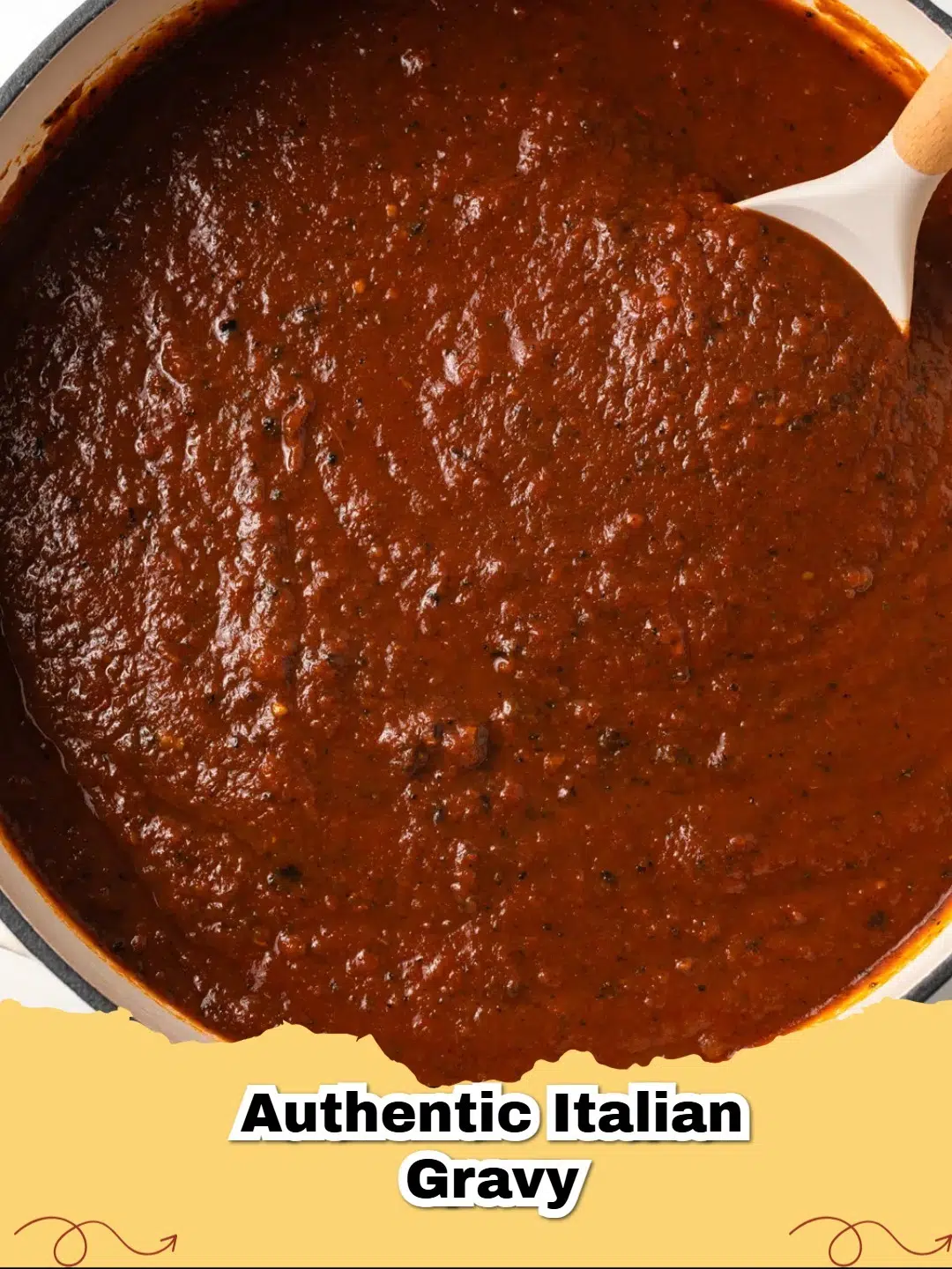 A large pot of authentic Italian Sunday Sauce (Gravy) simmering with beef short ribs and Italian sausage.