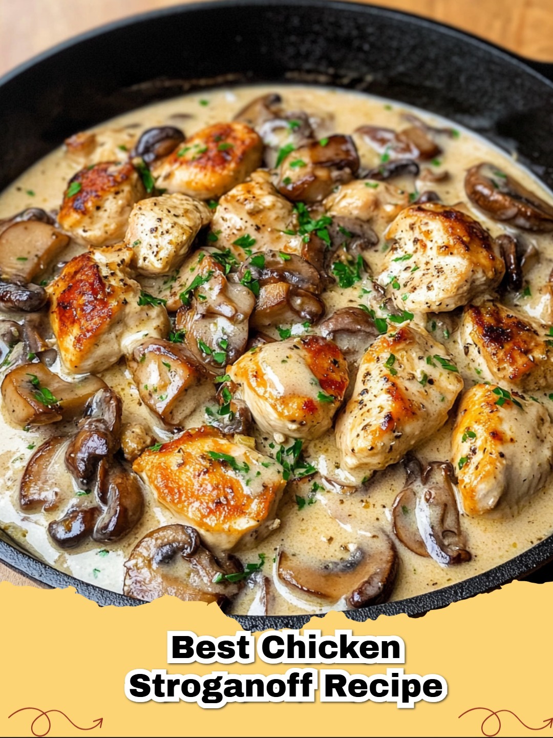 Platter of the best creamy chicken stroganoff recipe with egg noodles and fresh parsley.