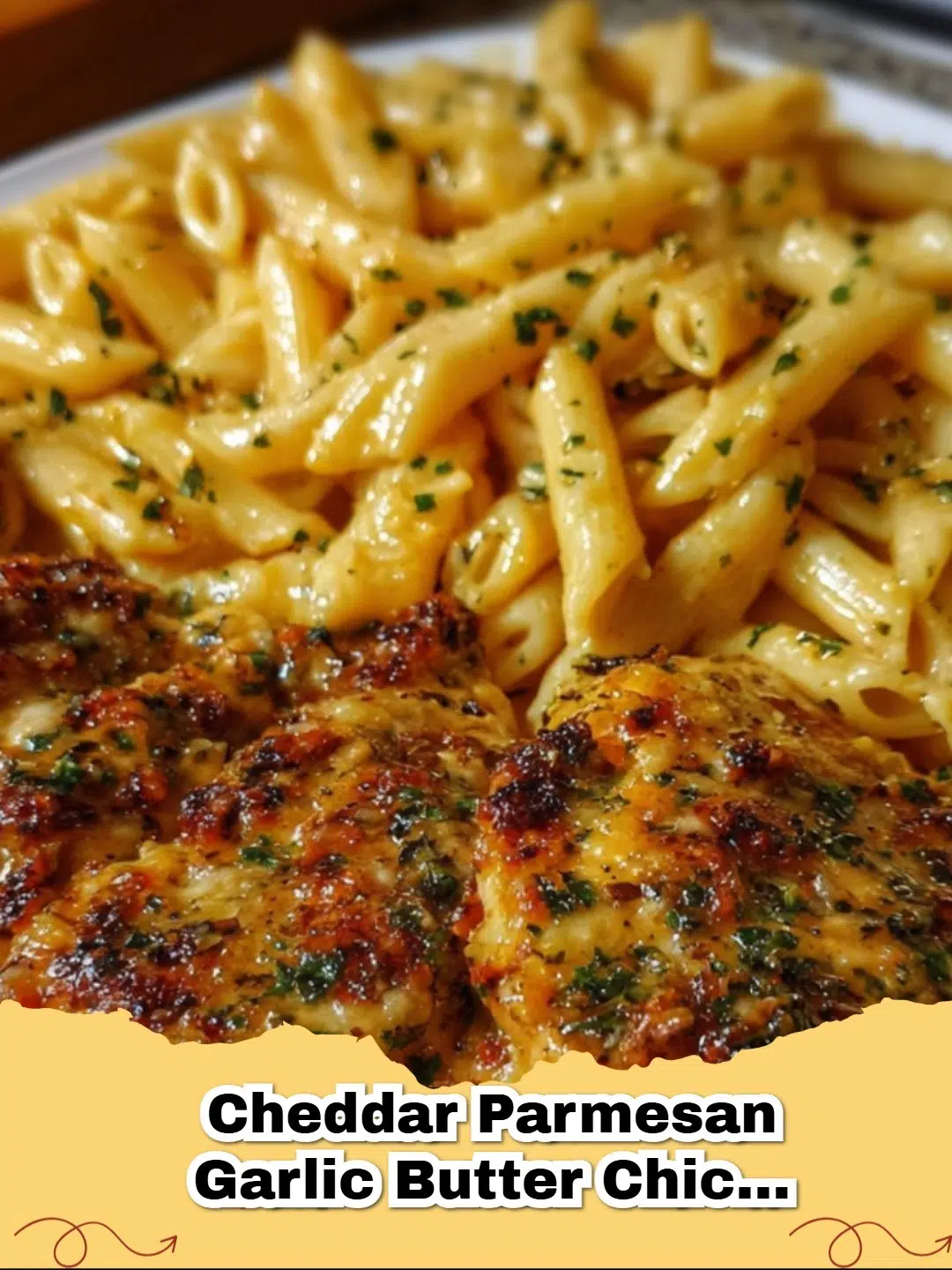 Delicious Cheddar Parmesan Garlic Butter Chicken with Creamy Penne Pasta in a skillet