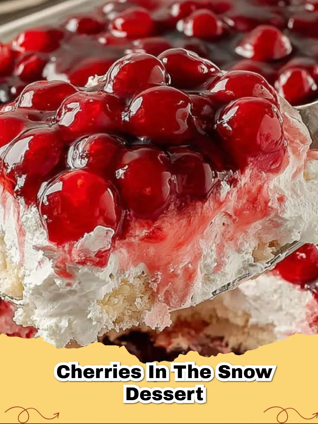 Delicious Cherries in the Snow dessert with creamy white filling and bright red cherry topping in a glass dish