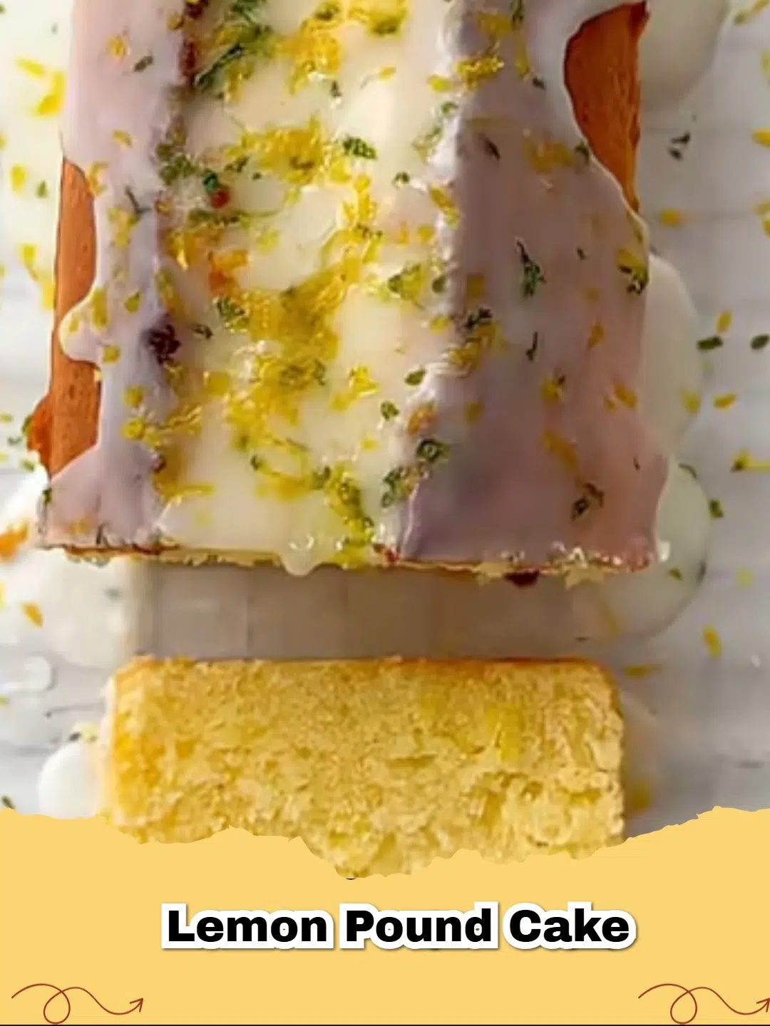 A perfectly sliced moist lemon pound cake with a glossy lemon glaze on a white platter, garnished with fresh lemon slices.