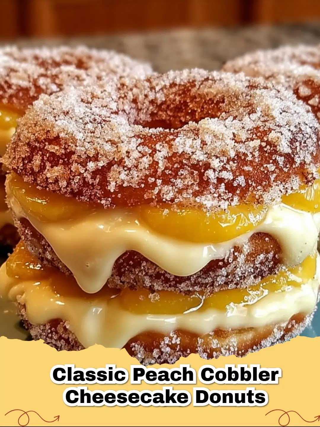 Classic Peach Cobbler Cheesecake Donuts with creamy glaze and peach topping.