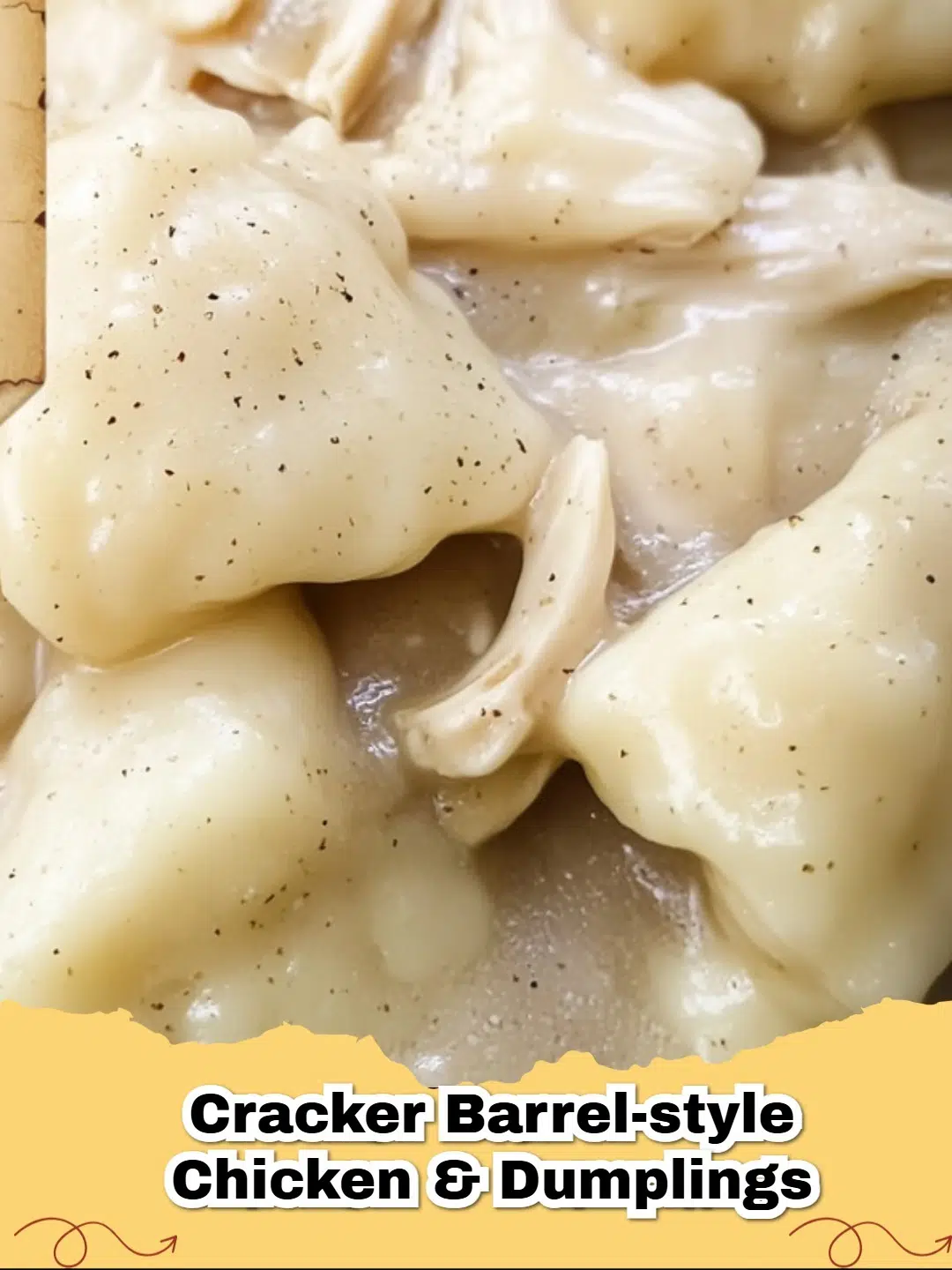A bowl of steaming Copycat Cracker Barrel Chicken and Dumplings, garnished with fresh parsley.