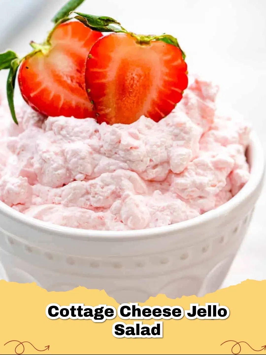 Refreshing Cottage Cheese Pineapple Jell-O Salad in a clear glass bowl, garnished with a mint leaf.