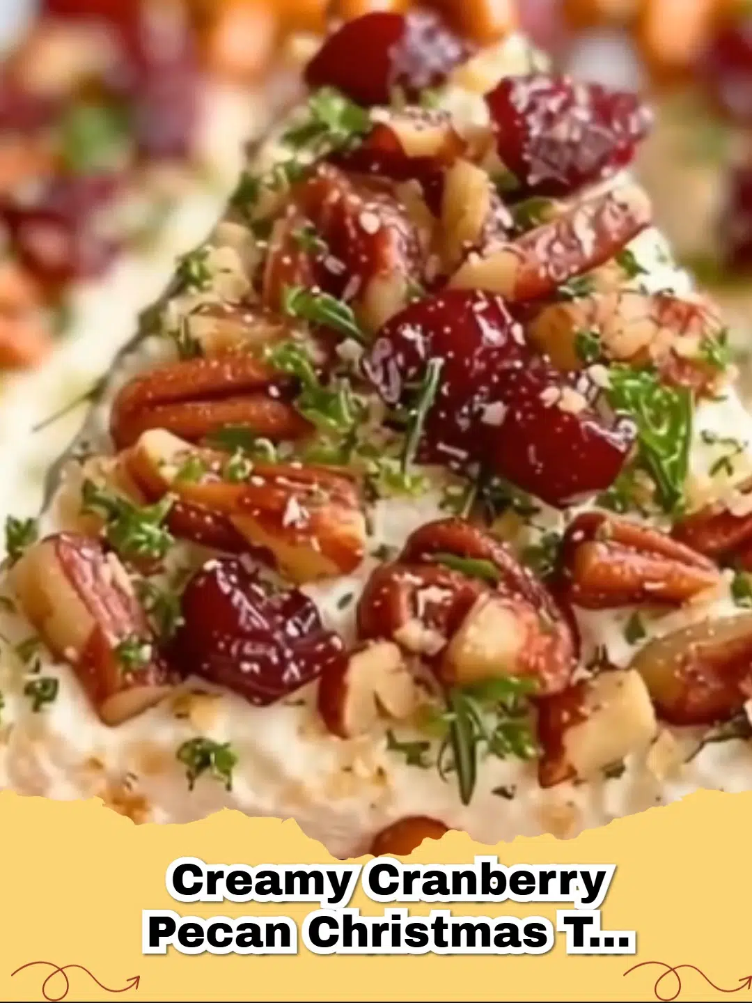 Platter of festive Creamy Cranberry Pecan Christmas Tree Appetizers garnished with fresh rosemary and pretzel trunks.