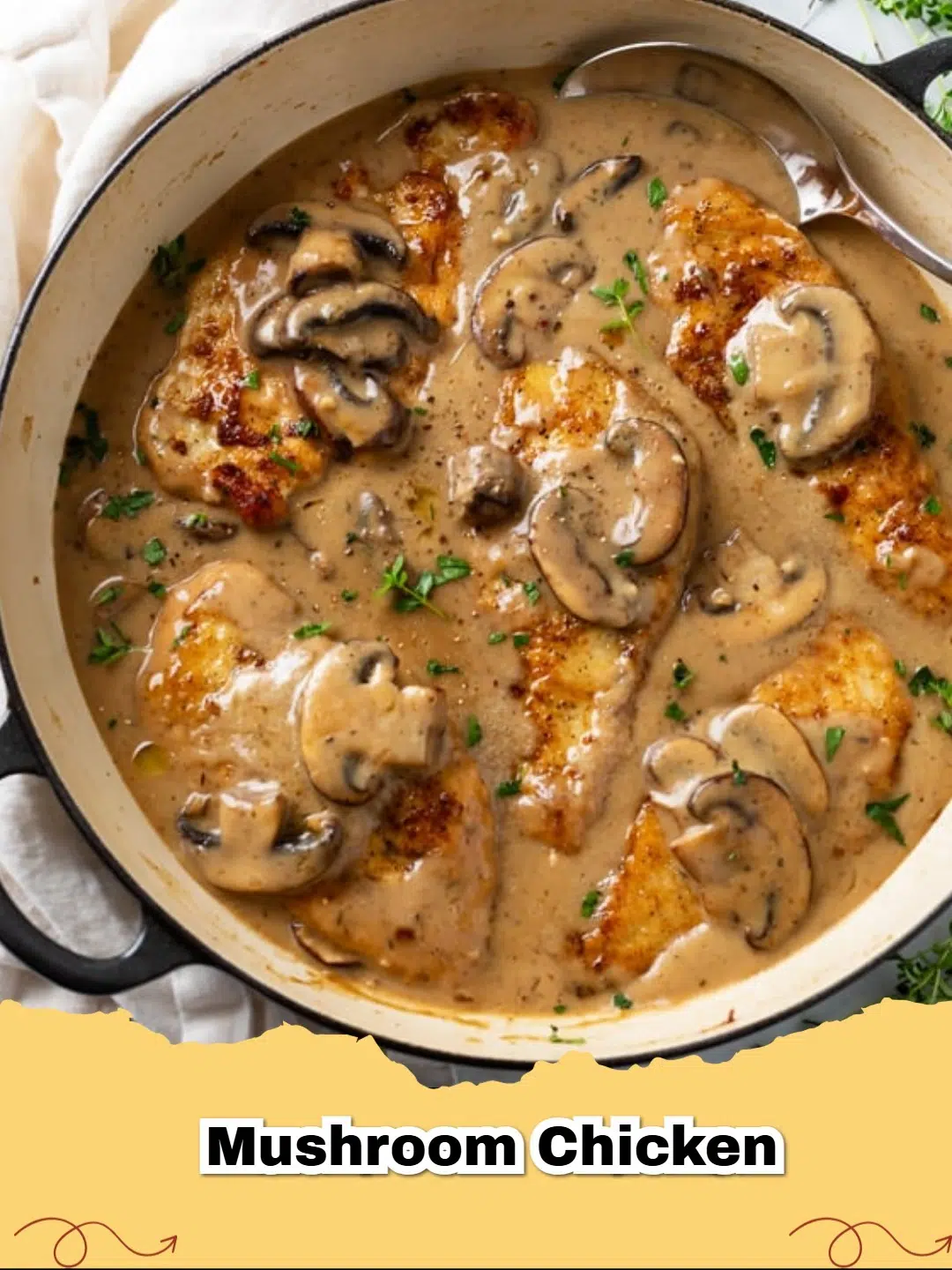 Close-up of a creamy mushroom chicken skillet with tender chicken pieces and earthy mushrooms in a rich sauce, garnished with fresh parsley.