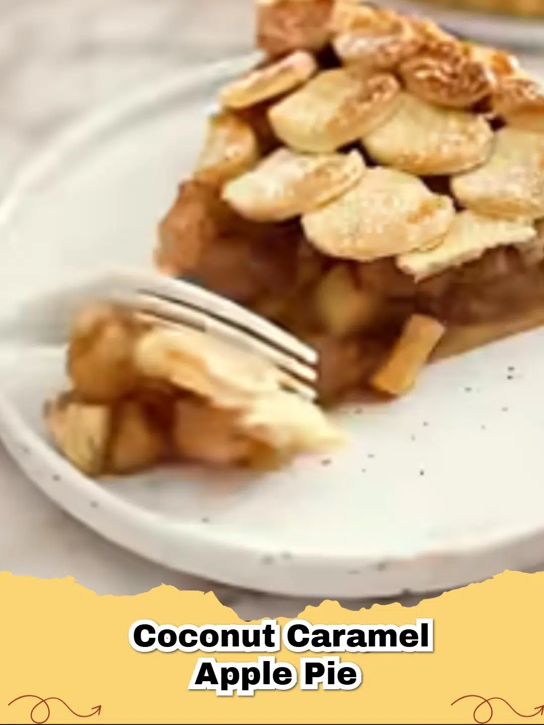 Slice of Coconut Caramel Apple Pie with a scoop of ice cream on a rustic table