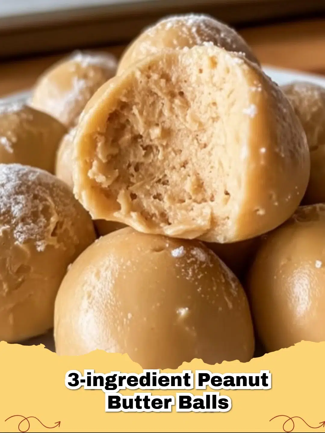 Delicious easy 3-ingredient no-bake peanut butter balls on a parchment-lined baking sheet.