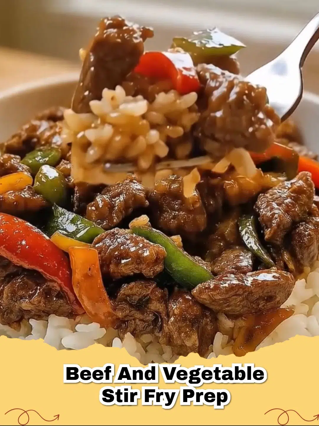 Close-up of a vibrant and delicious Easy Beef and Vegetable Stir Fry served over white rice, garnished with sesame seeds.