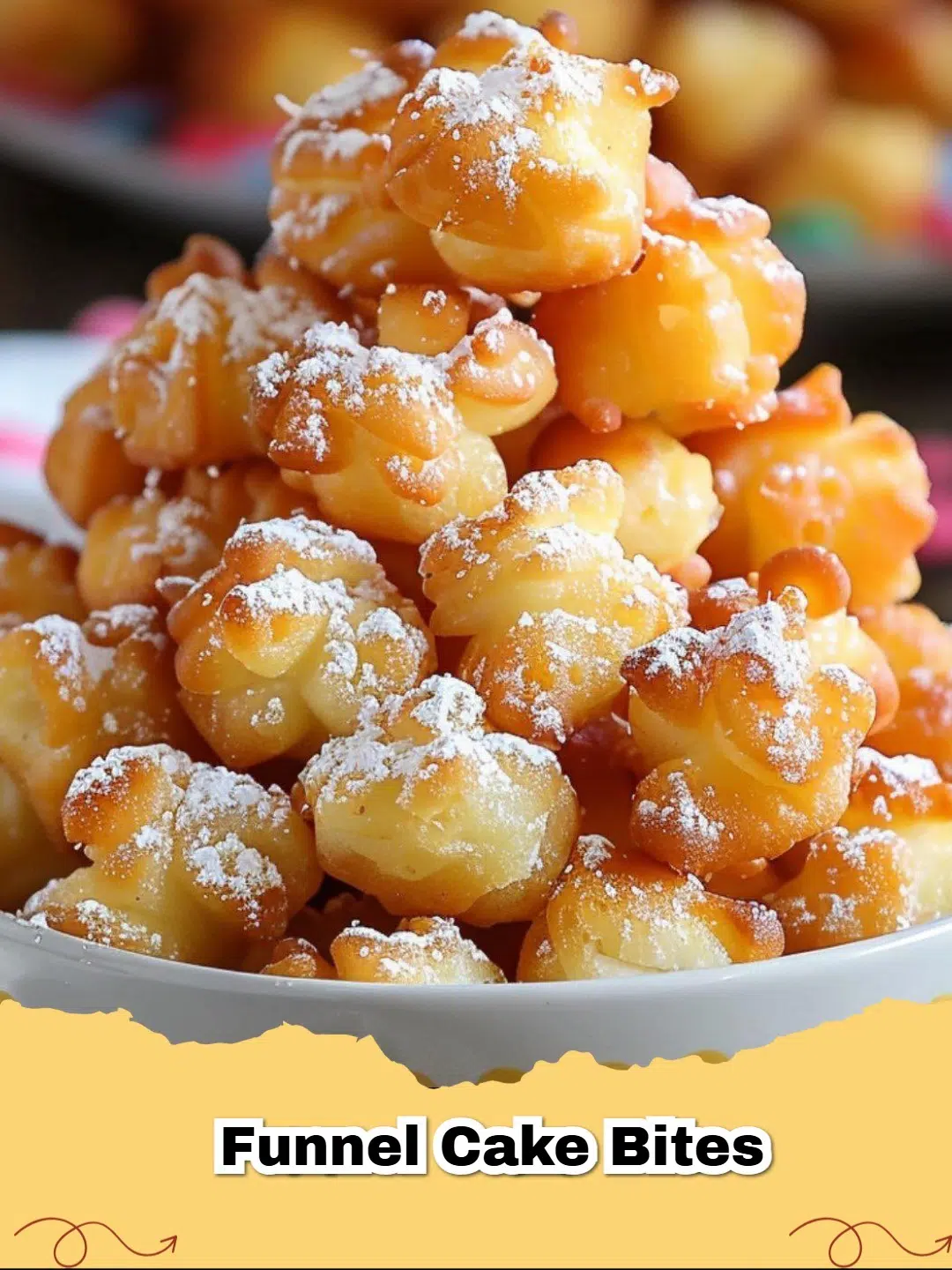 Easy Funnel Cake Bites piled high with powdered sugar