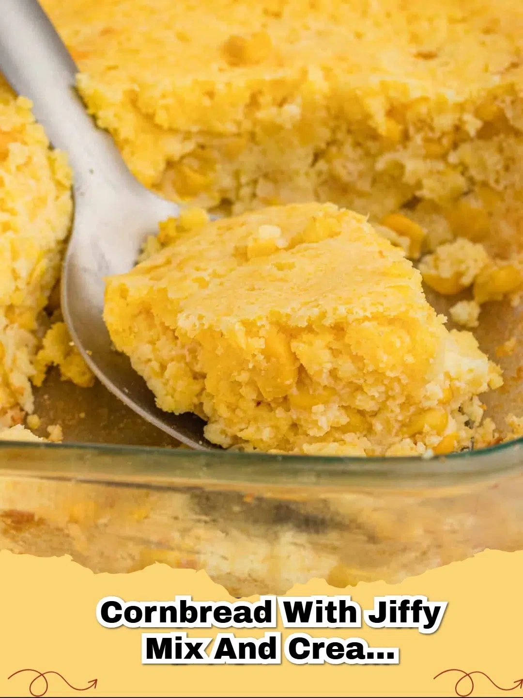 A golden brown slice of easy Jiffy cornbread with creamed corn, ready to serve.