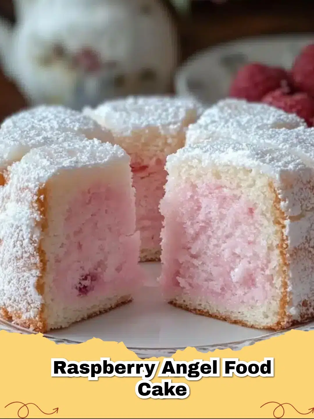 Delicious slice of Easy Raspberry Angel Food Cake with fresh raspberries and a dusting of powdered sugar