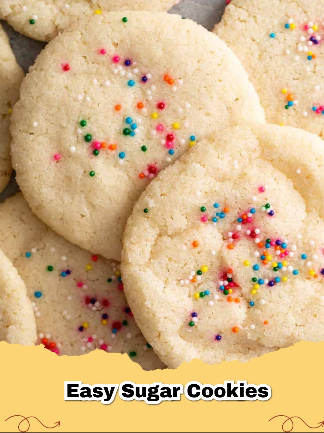 Close up of soft and buttery no-chill sugar cookies with rainbow sprinkles on a cooling rack.