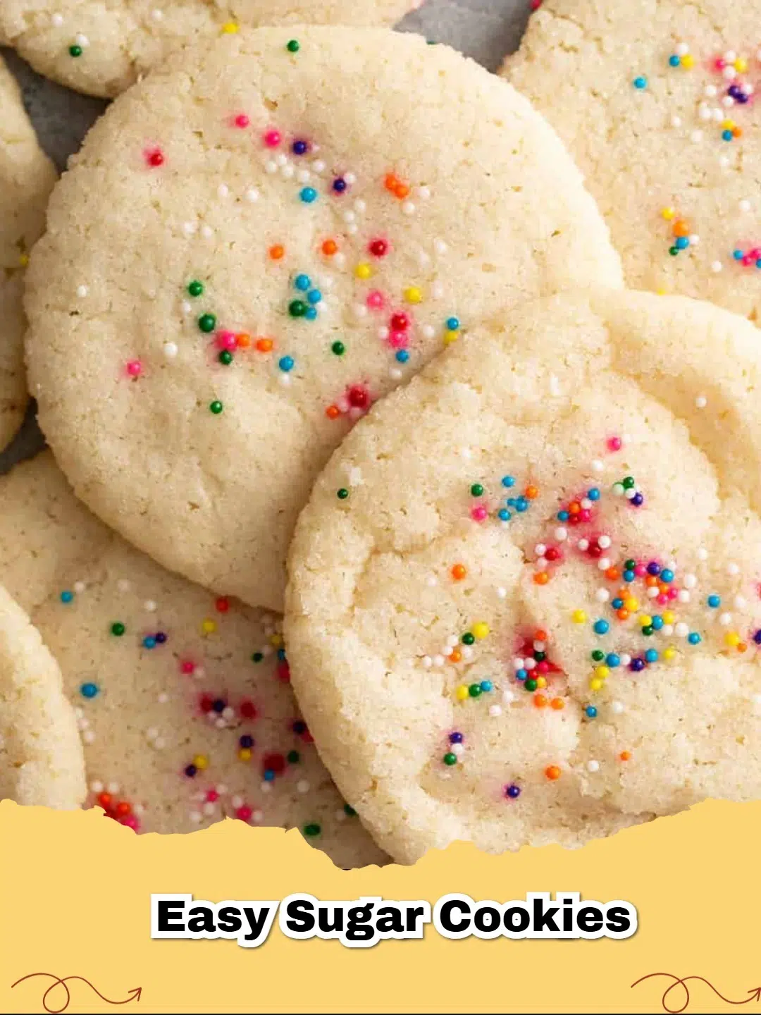 Close up of soft and buttery no-chill sugar cookies with rainbow sprinkles on a cooling rack.
