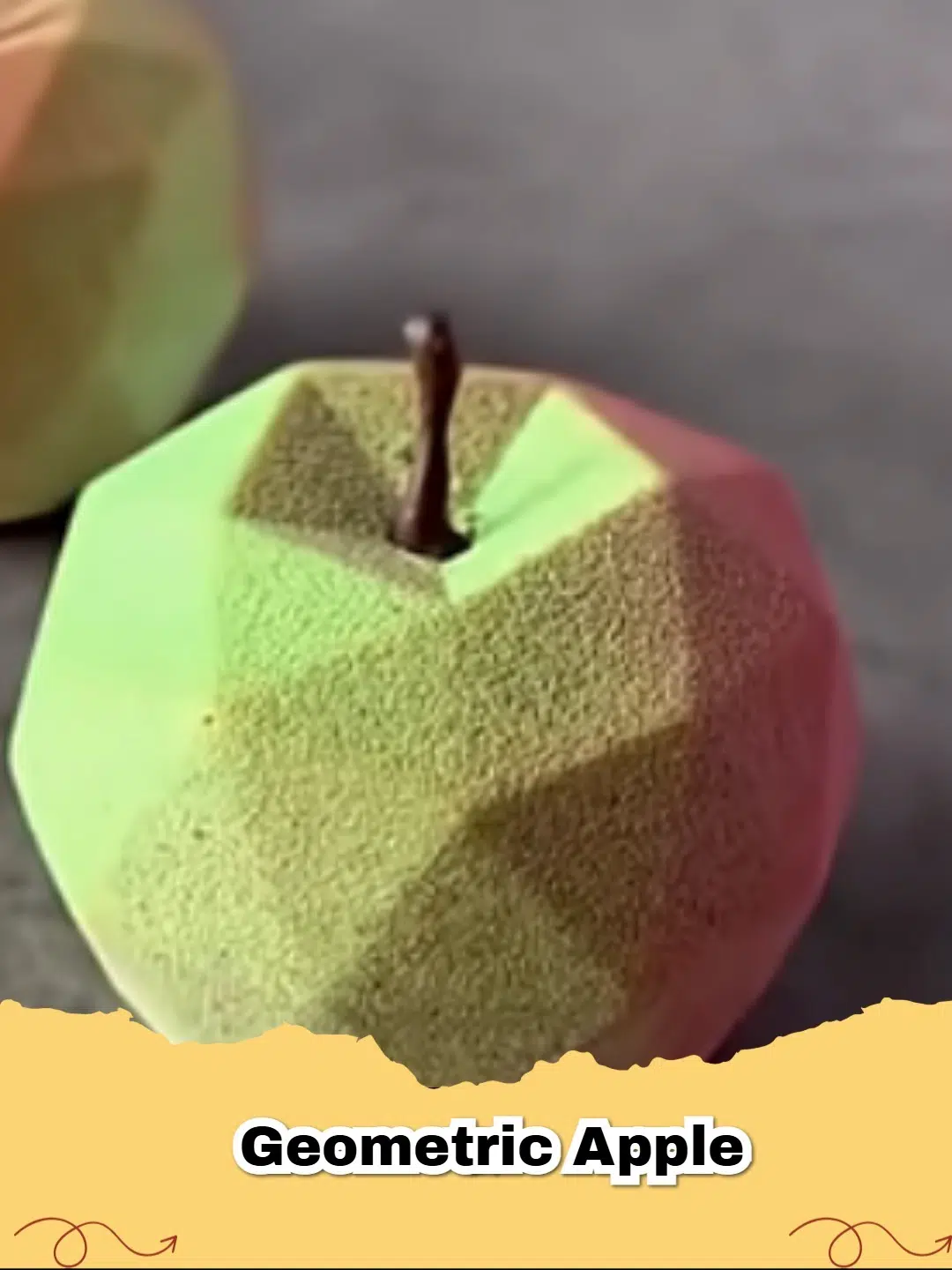 Elegant geometric apple tart with intricately arranged apple slices on a golden, flaky crust, ready to be served.