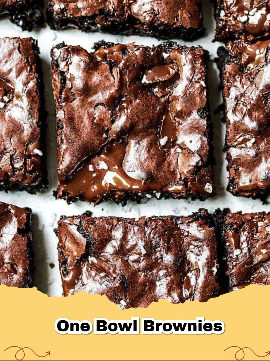Close-up of rich, fudgy one bowl brownies topped with chocolate chunks.