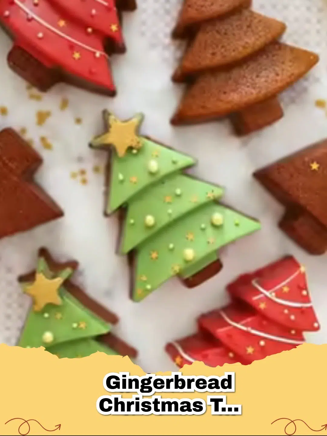Beautifully decorated gingerbread Christmas tree cookies on a cooling rack.