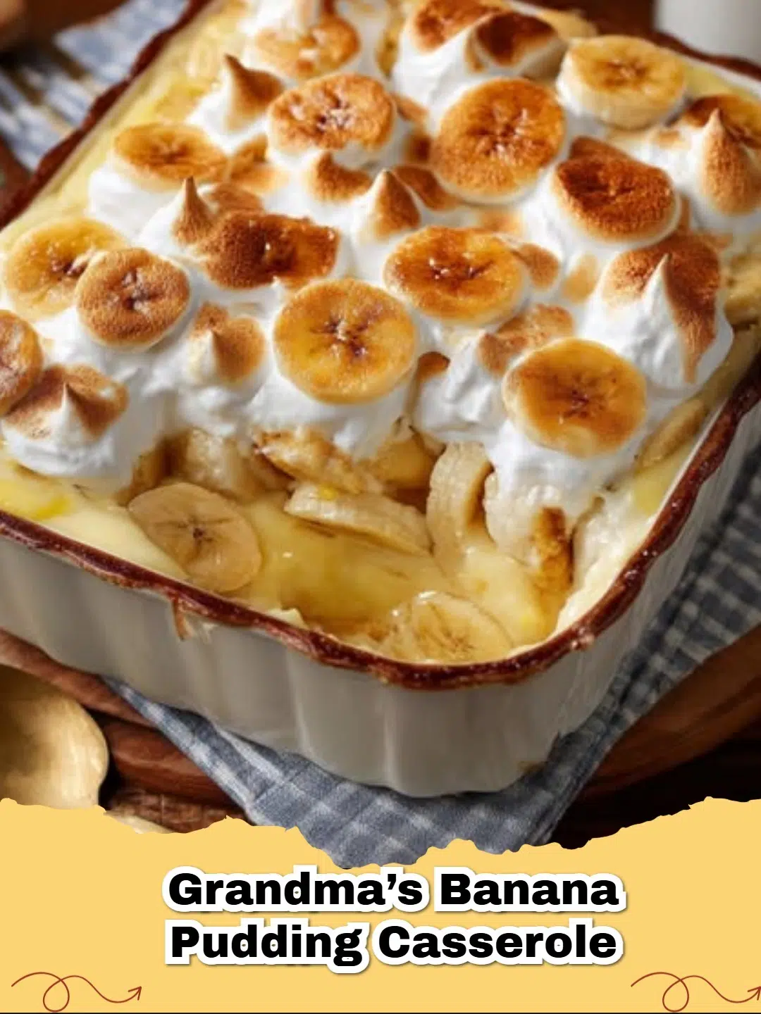 A golden-brown Grandma's Banana Pudding Casserole, topped with fluffy meringue and visible layers of bananas and wafers.