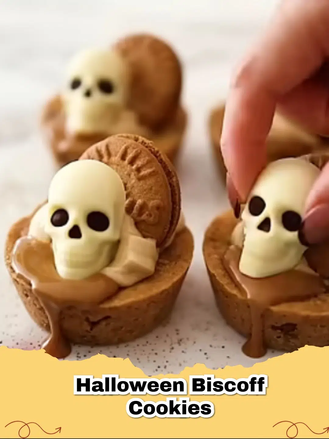 Delicious Halloween Biscoff cookies decorated with spooky spiderwebs on a festive autumn background.