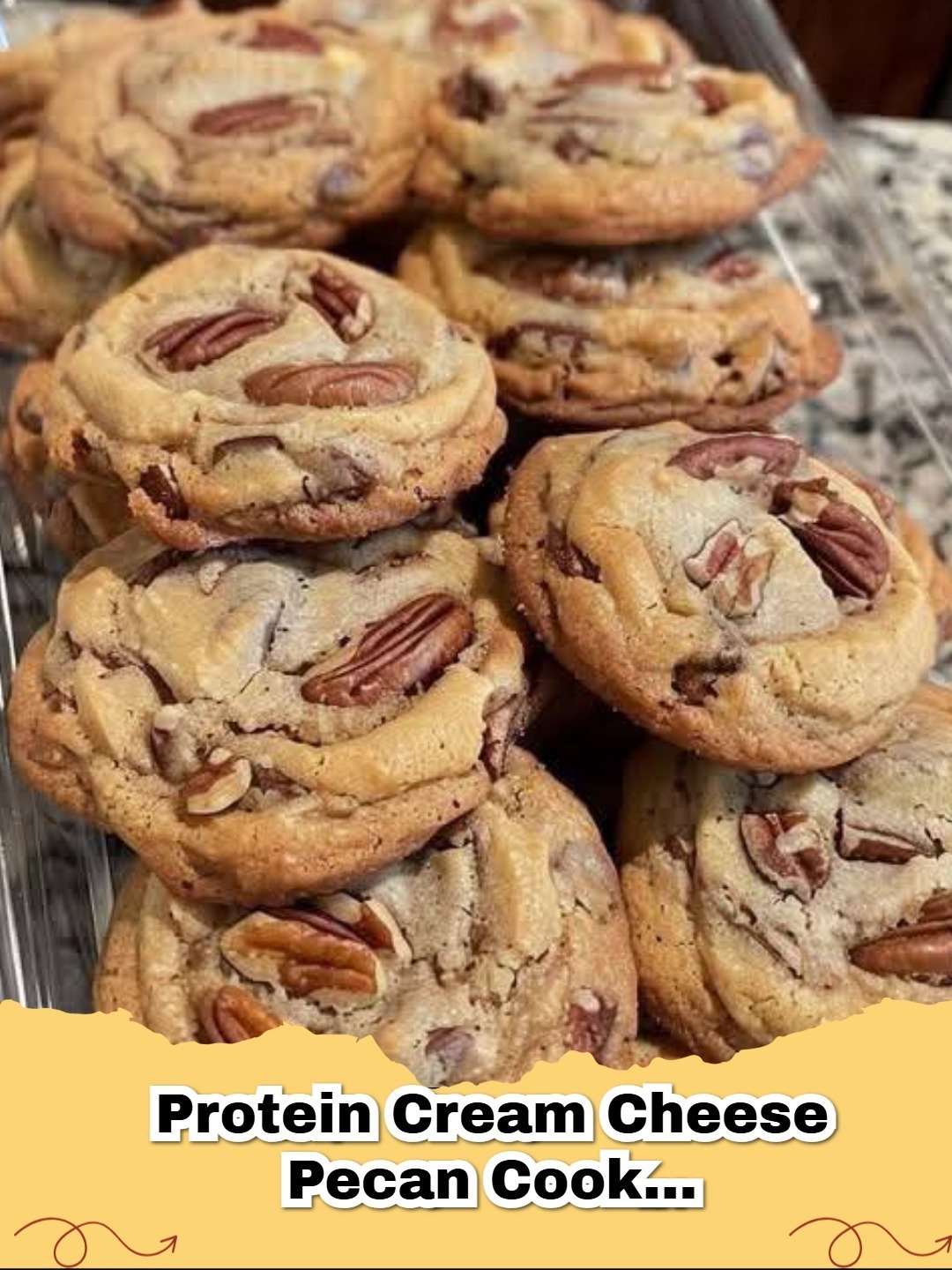 Plate of golden Keto Protein Cream Cheese Pecan Cookies with chopped pecans