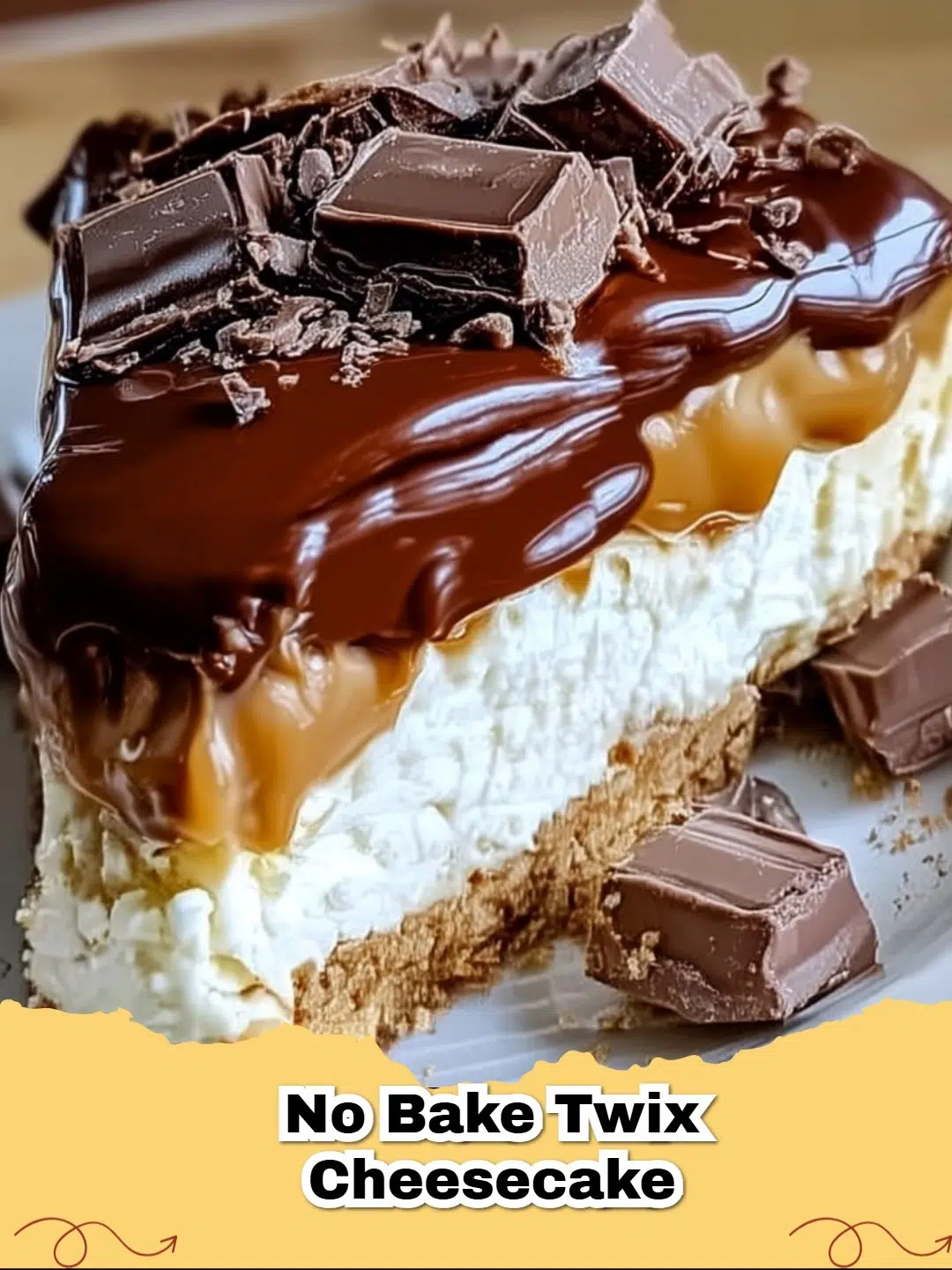 Decadent No-Bake Twix Cheesecake with caramel drizzle and chopped Twix bars on top, ready to serve.