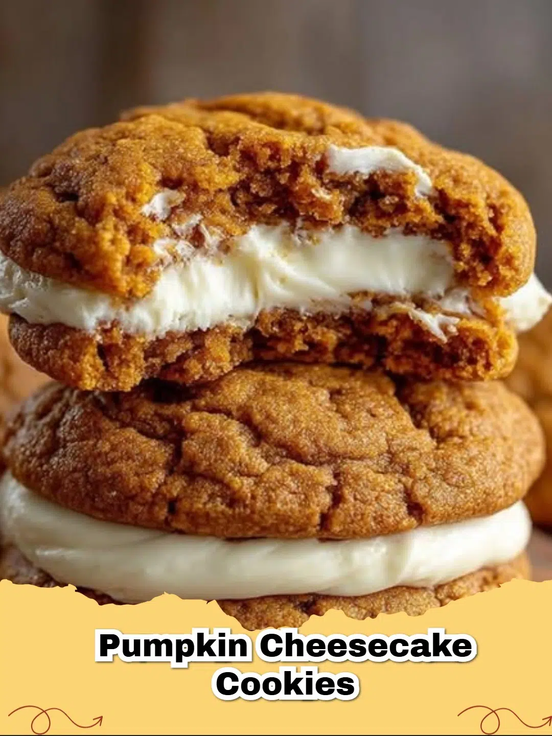 Delicious pumpkin cheesecake cookies with a creamy white swirl on a cooling rack
