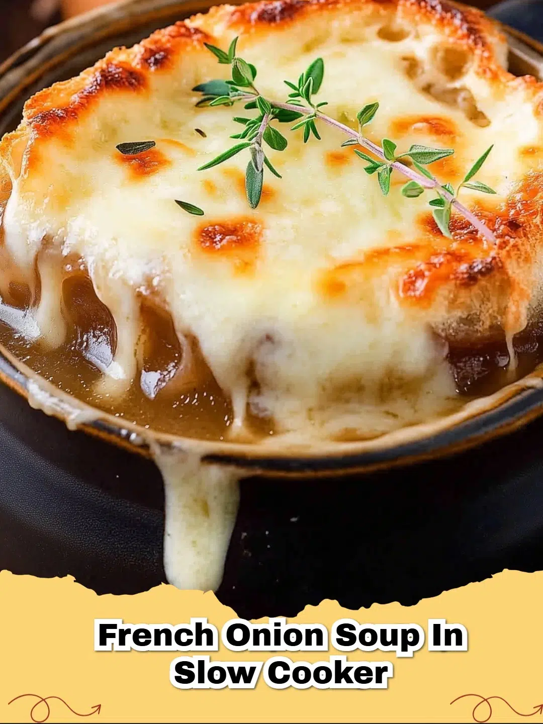Delicious Slow Cooker French Onion Soup topped with melted Gruyere cheese and a golden crouton.