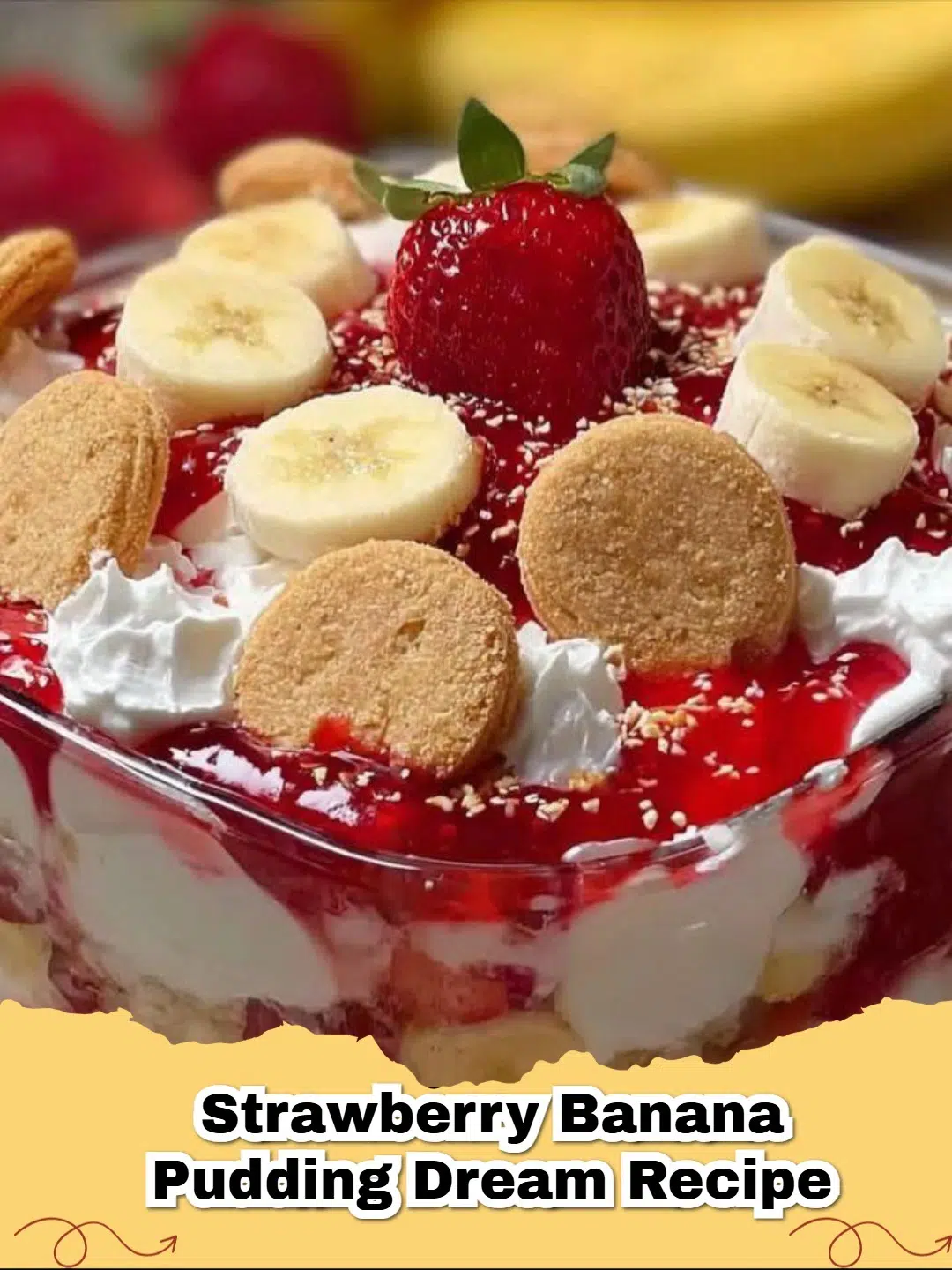 Delicious layers of Strawberry Banana Pudding in a glass dish, garnished with fresh fruit and vanilla wafers.