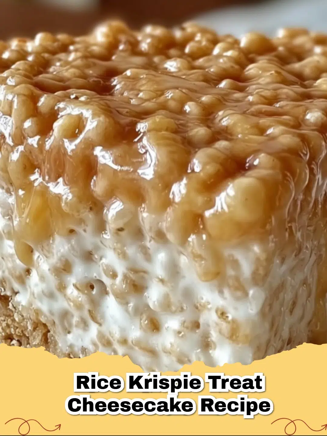 Delicious slice of No-Bake Rice Krispie Treat Cheesecake with a golden crust and creamy white filling, topped with mini marshmallows.