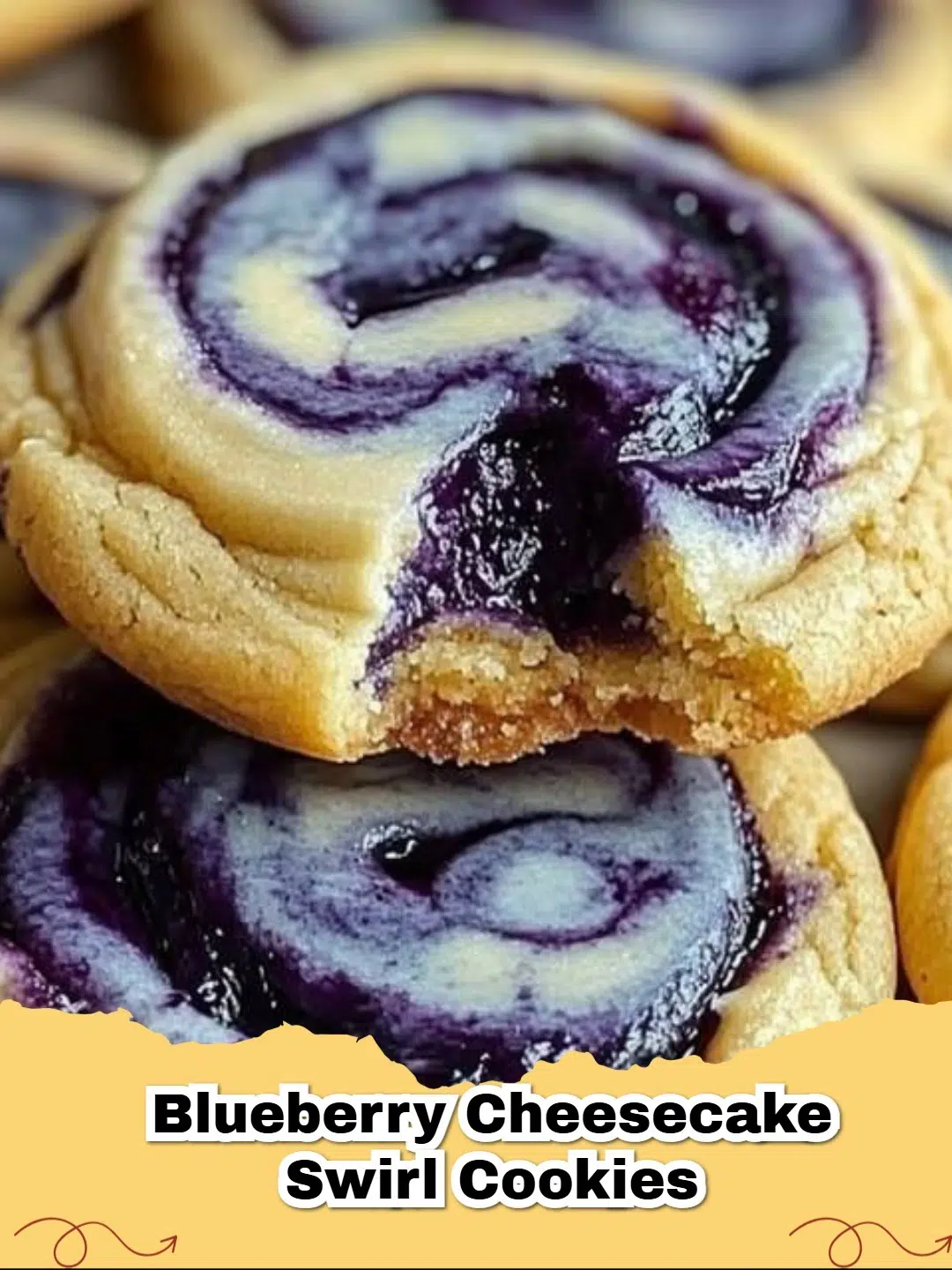 Delicious homemade blueberry cheesecake swirl cookies on a cooling rack, with a creamy filling visible.