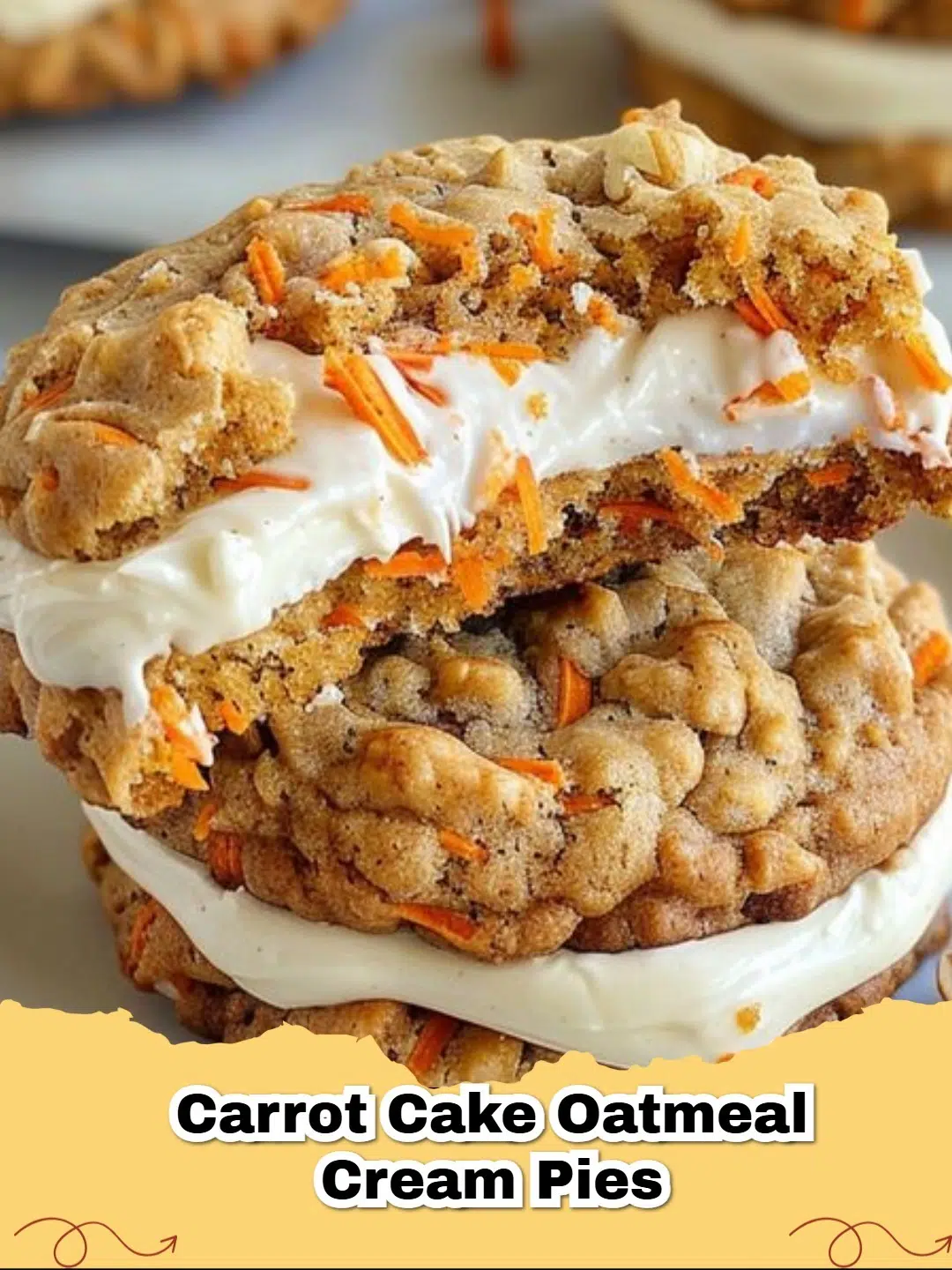 Close-up of Carrot Cake Oatmeal Cream Pies with creamy filling, garnished with a sprinkle of cinnamon.