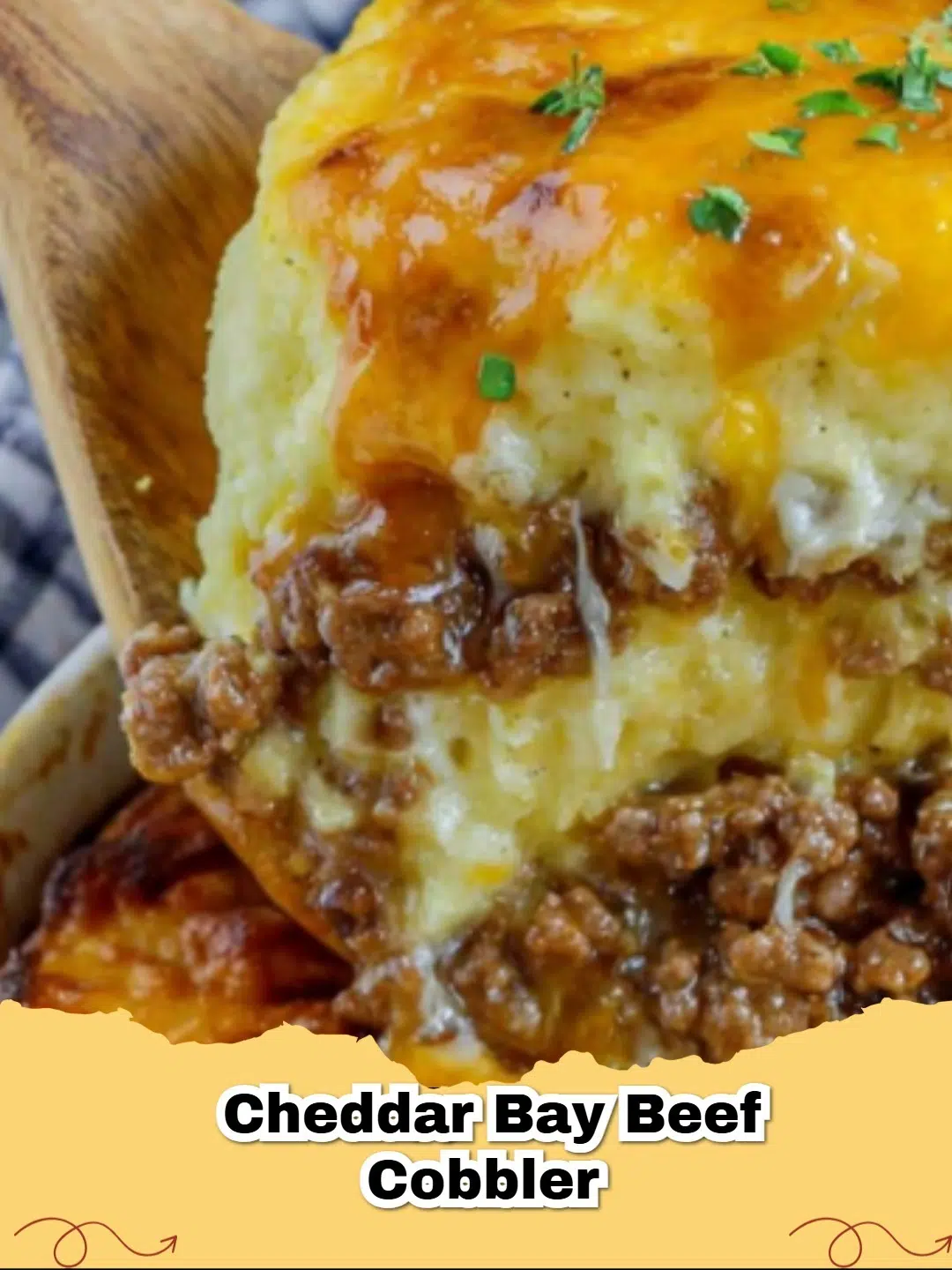 Hearty Cheddar Bay Ground Beef Cobbler baked in a casserole dish, ready to serve.
