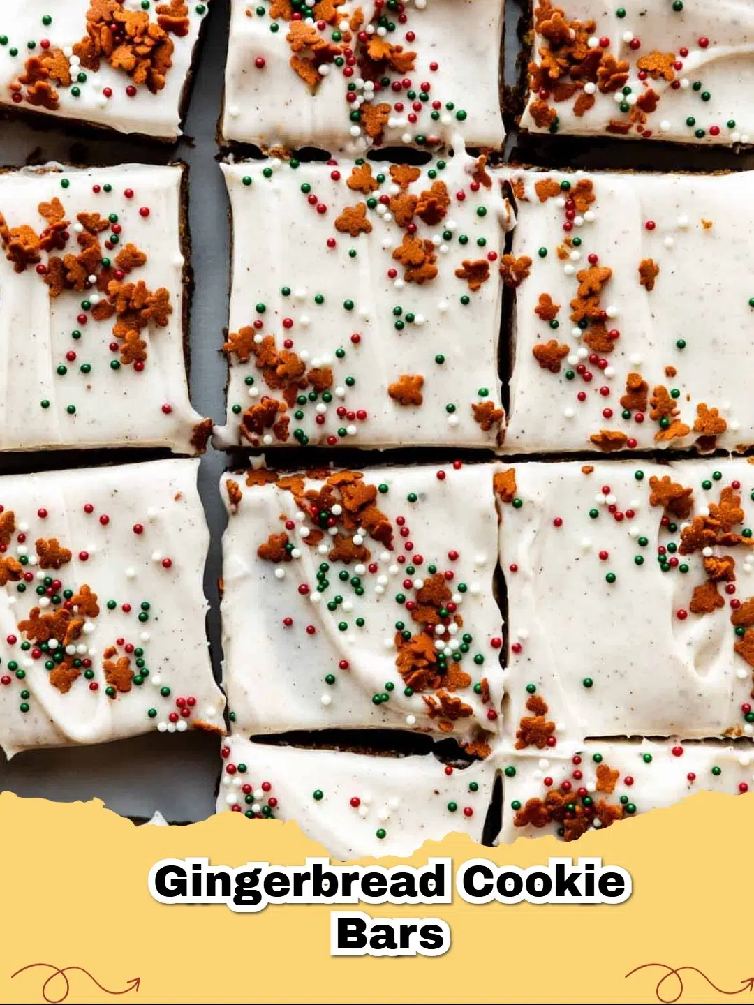 Close-up of a stack of chewy gingerbread cookie bars with powdered sugar dusting on a festive plate.