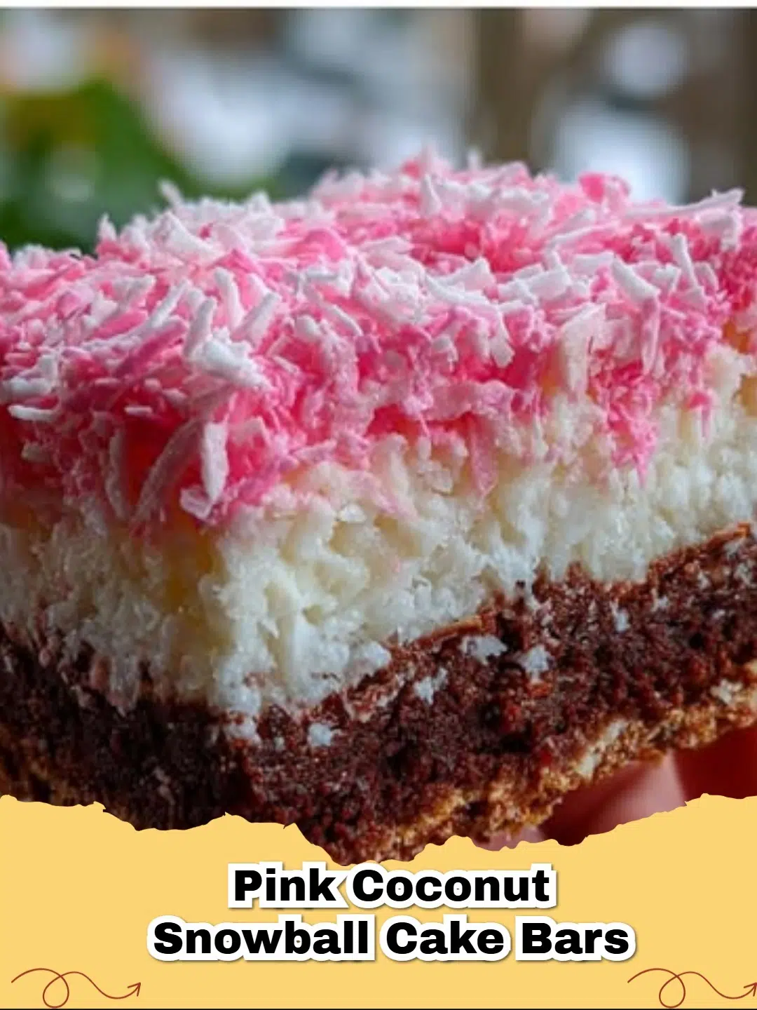 Delicious Chocolate Pink Coconut Snowball Cake Bars with shredded coconut topping on a serving plate.