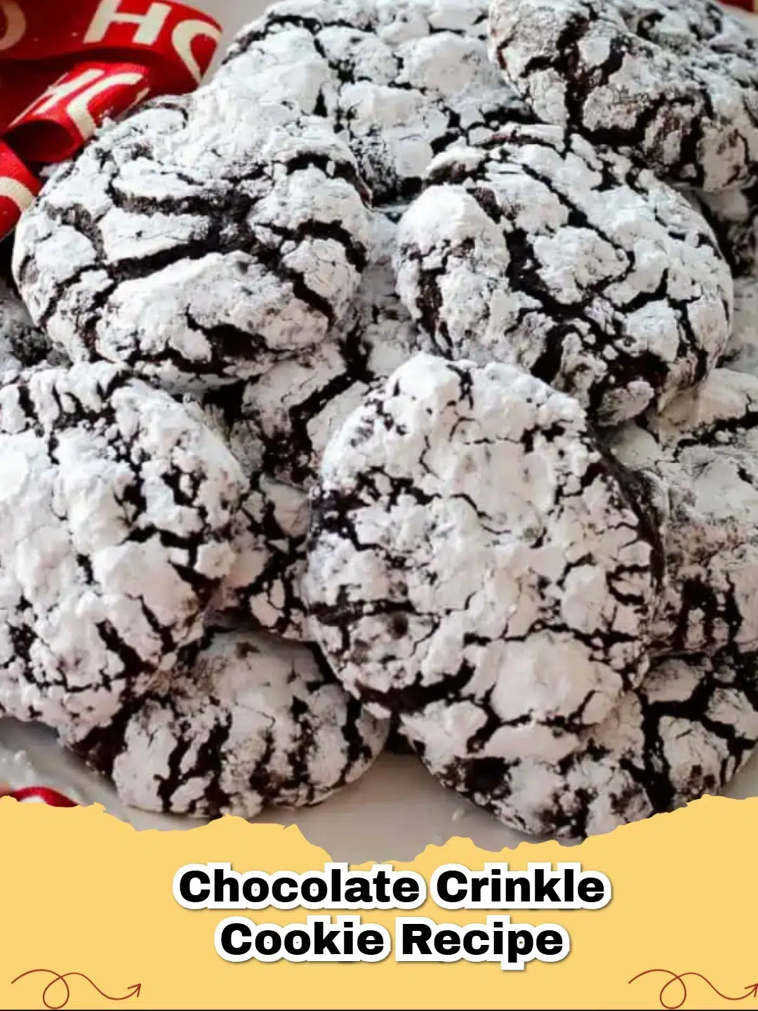 Pile of fudgy chocolate crinkle cookies covered in powdered sugar on a cooling rack, ready to eat.