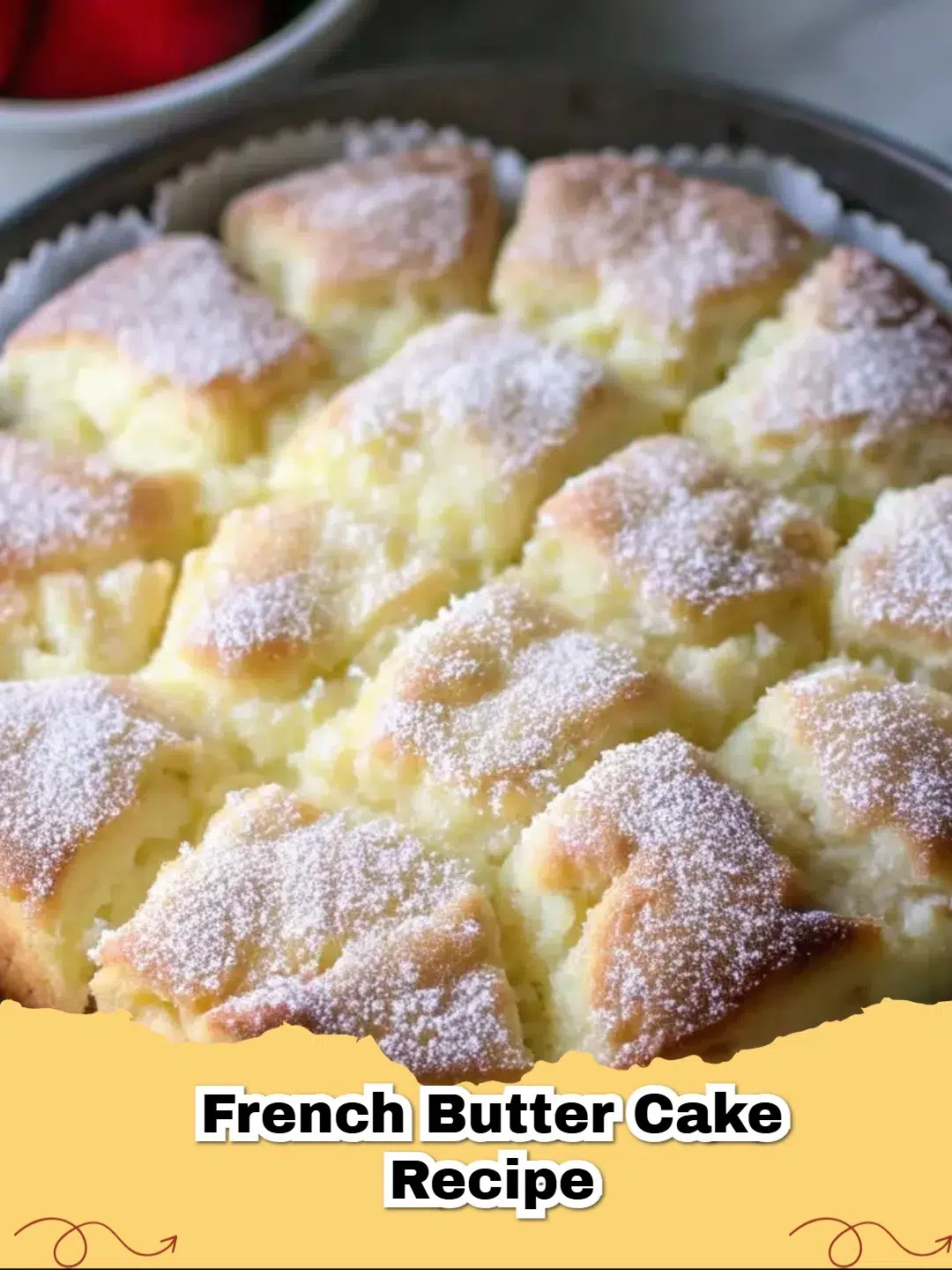 A golden brown classic French butter cake (Gâteau au Beurre) dusted with powdered sugar on a white plate.