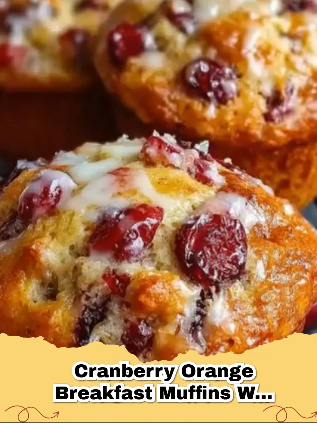 Fluffy Cranberry Orange Breakfast Muffins with a golden-brown top and sparkling sugar, perfect for the holidays.