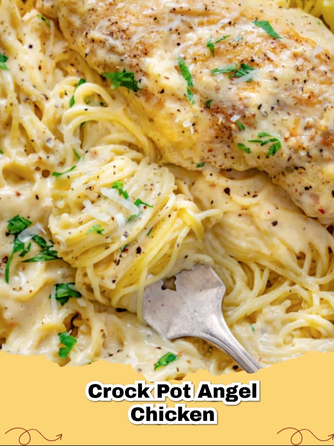 Creamy Crock Pot Angel Chicken served over pasta with fresh parsley garnish