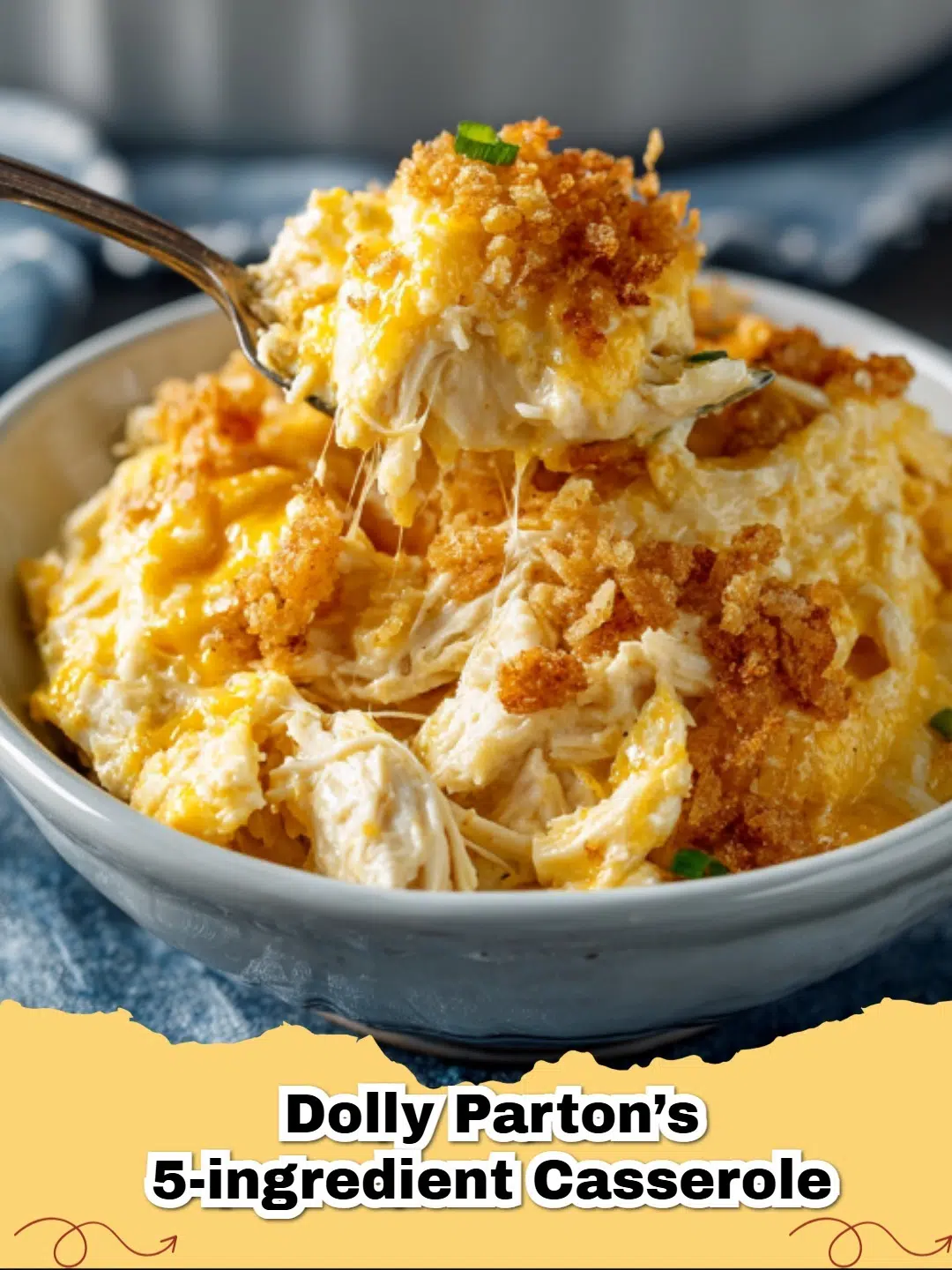 Golden brown Dolly Parton's 5-Ingredient Chicken & Biscuit Casserole with bubbly cheese and flaky biscuits.