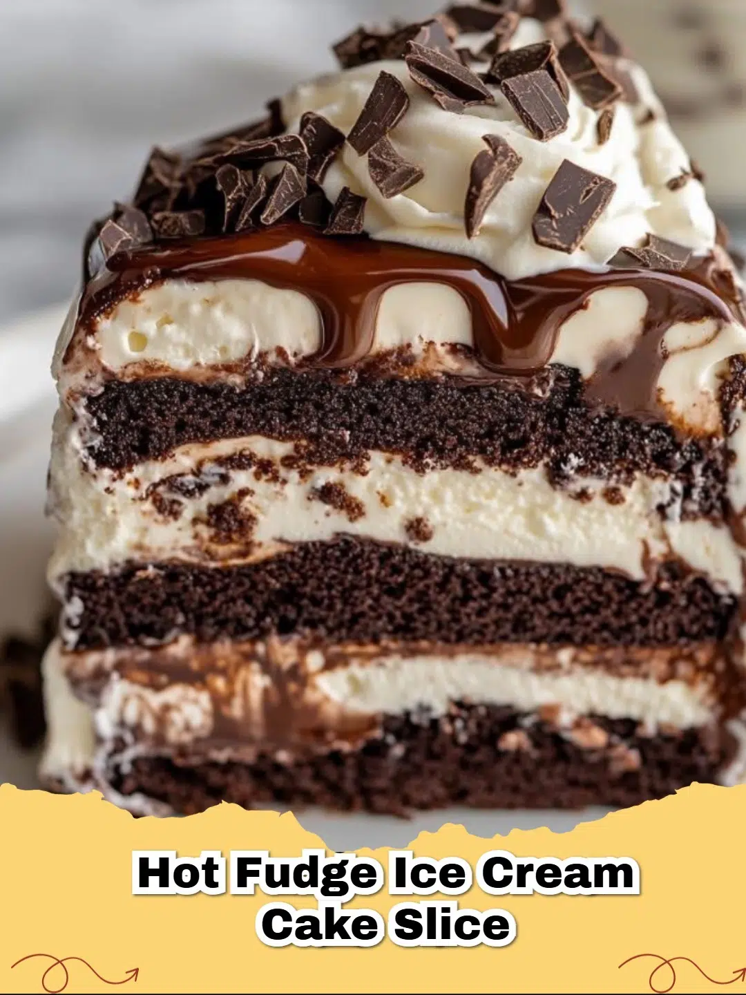 Decadent slice of Easy Chocolate Hot Fudge Ice Cream Cake with whipped cream and sprinkles