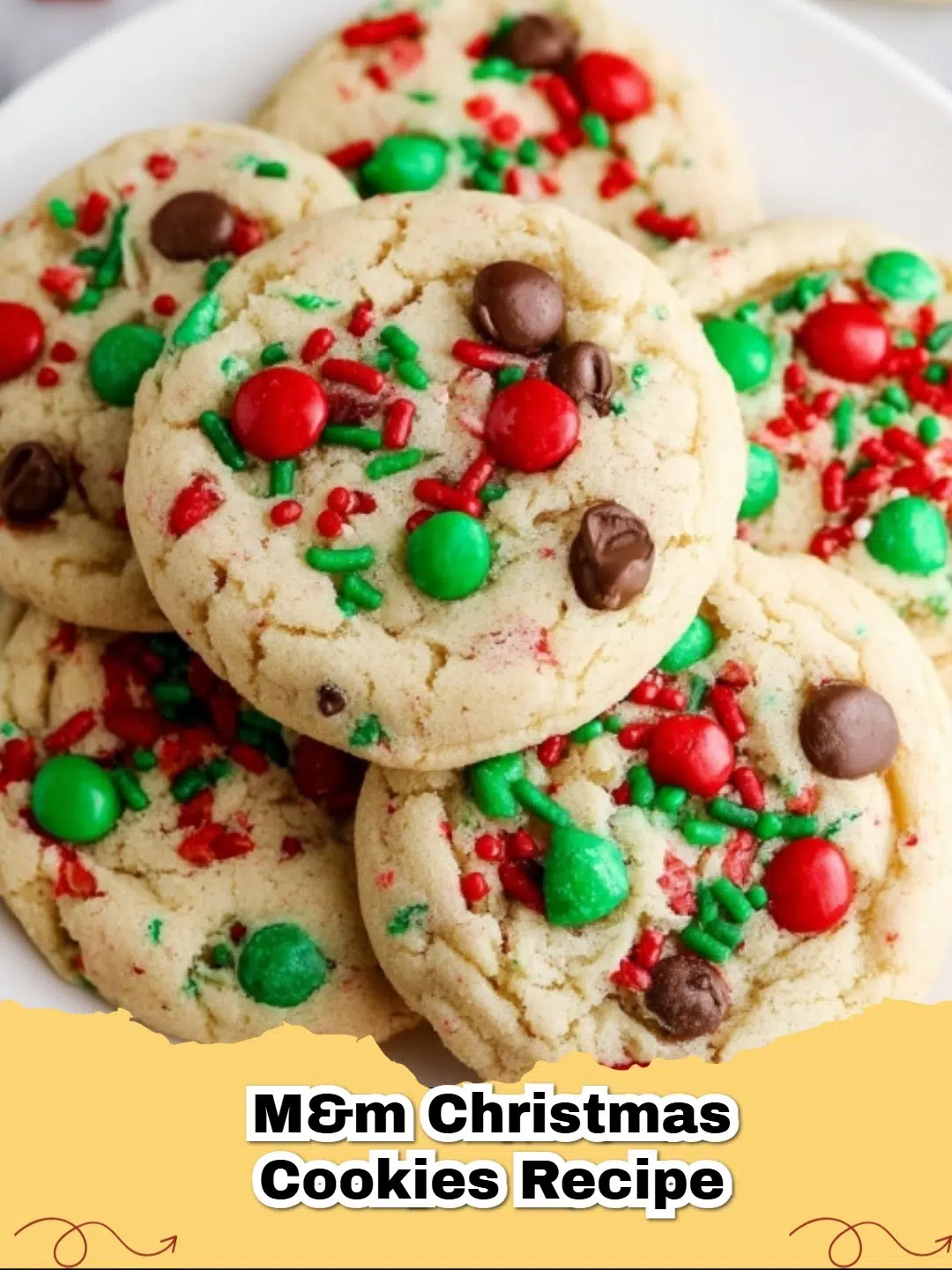 Delicious M&M Christmas Cookies on a festive plate, scattered with red and green M&Ms, ready for holiday celebrations.