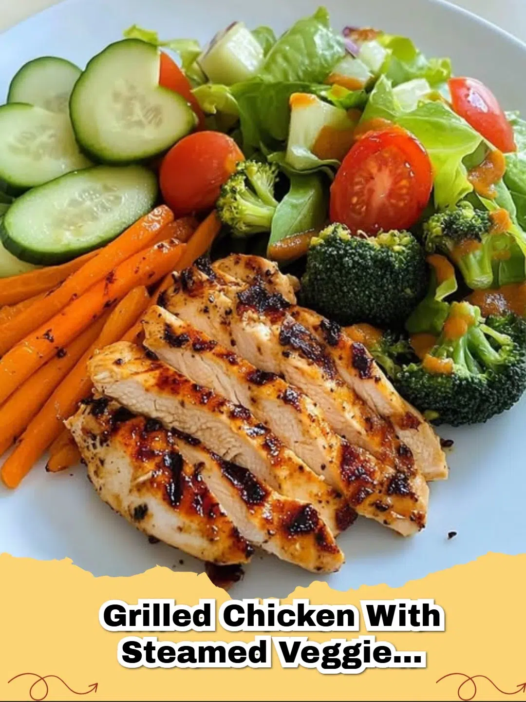 Healthy grilled chicken dinner with steamed broccoli, carrots, green beans, and a fresh garden salad on a white plate.