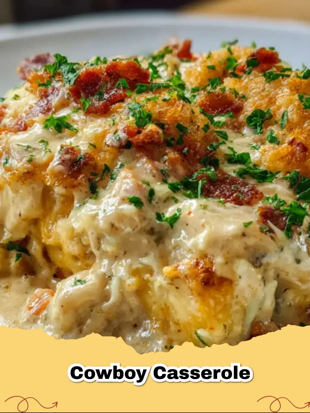 A golden-brown, bubbly Cowboy Casserole with melted cheese and crispy tater tots, perfect for a hearty family dinner.