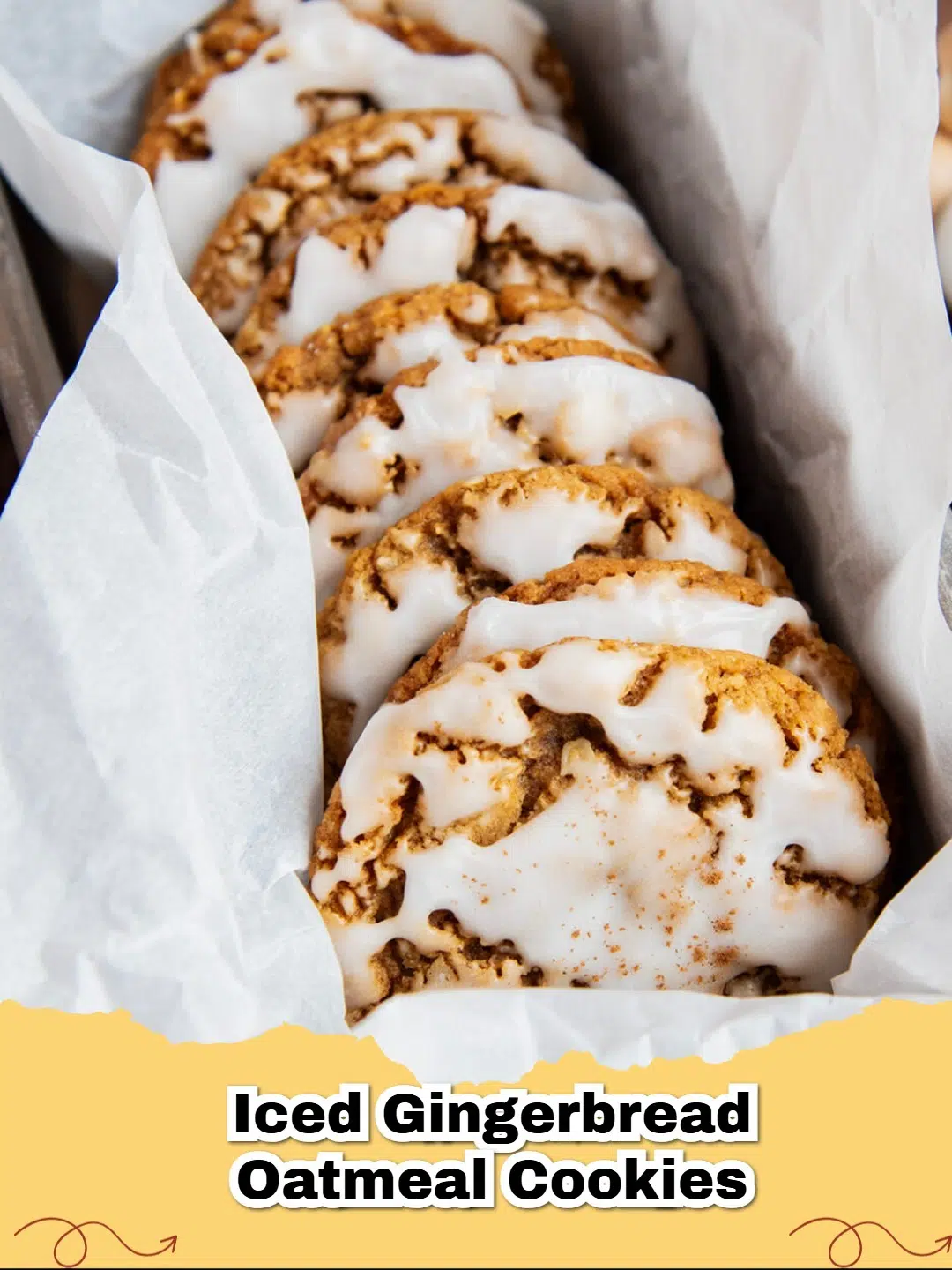A plate of Iced Gingerbread Oatmeal Cookies with a dusting of cinnamon, perfect for holiday baking.