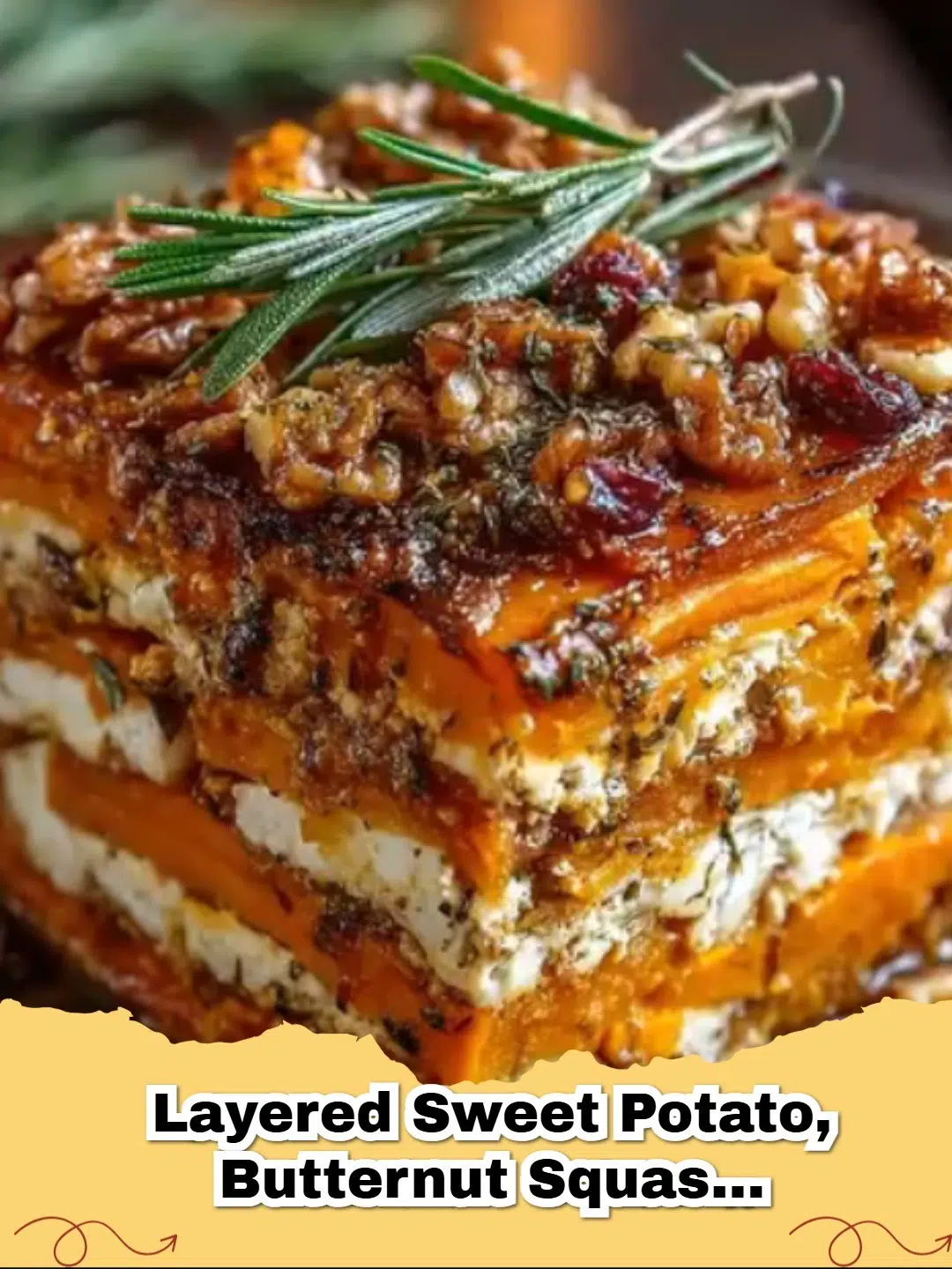 Vibrant layered sweet potato, butternut squash, and carrot lasagna with feta, walnuts, and cranberry-honey glaze, garnished with fresh herbs.