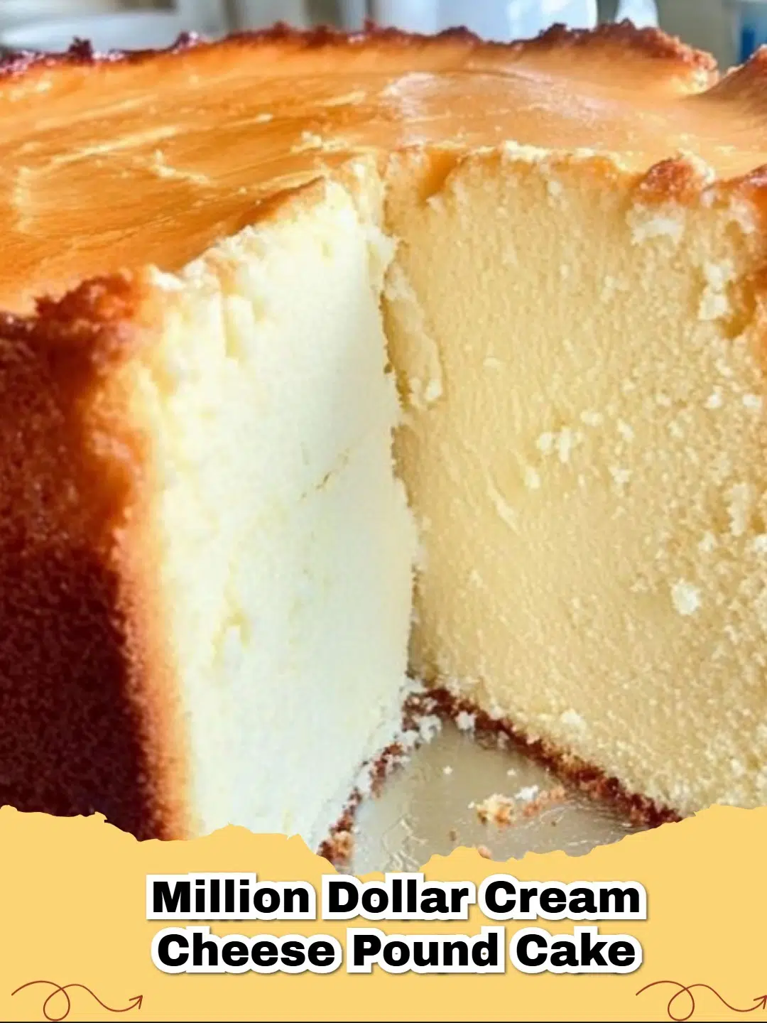 A perfectly golden brown Million Dollar Cream Cheese Pound Cake, sliced to show its moist, dense crumb, on a white plate.