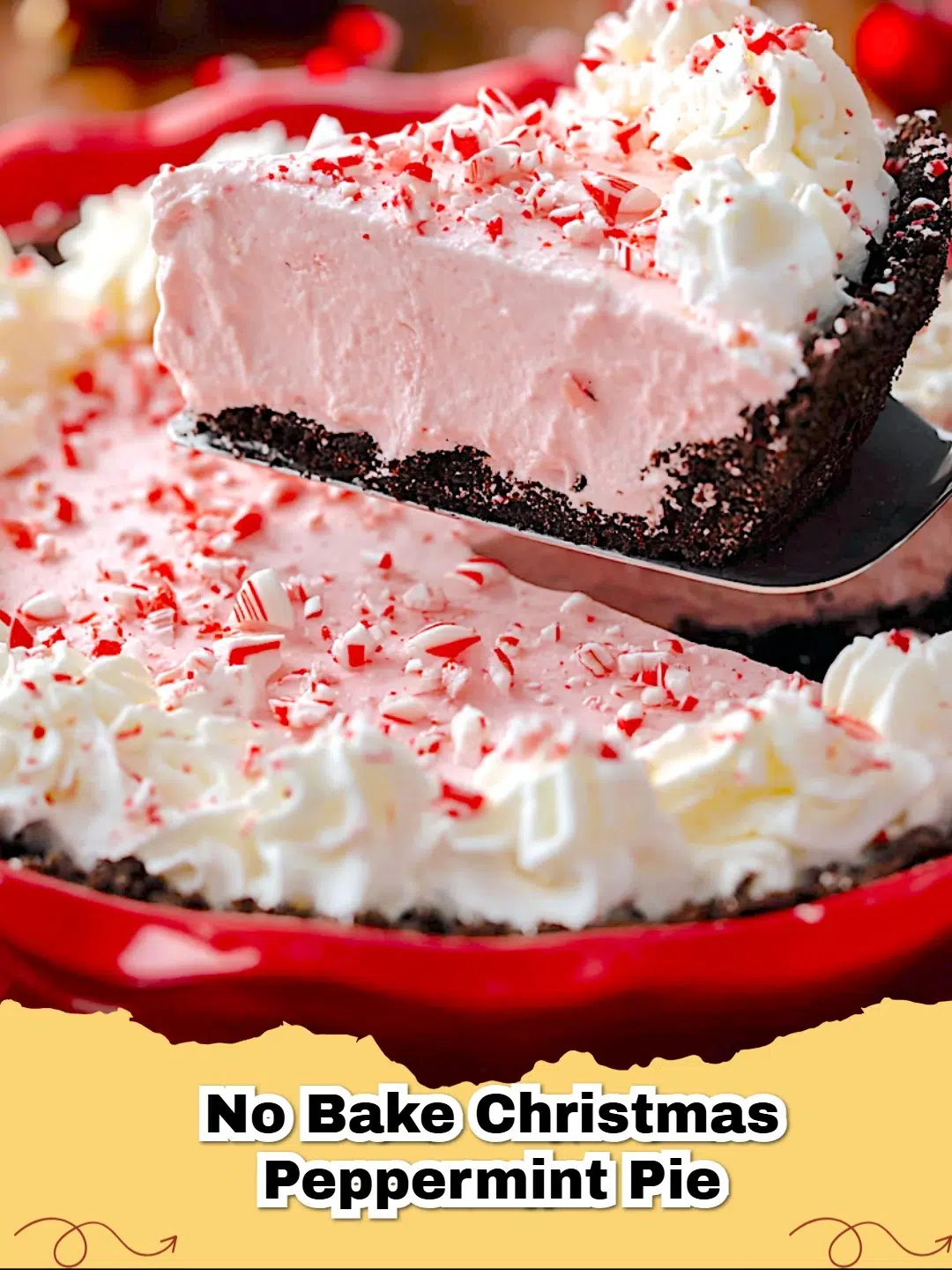 A vibrant No-Bake Christmas Peppermint Cheesecake Pie, topped with whipped cream and crushed candy canes, on a festive holiday table.