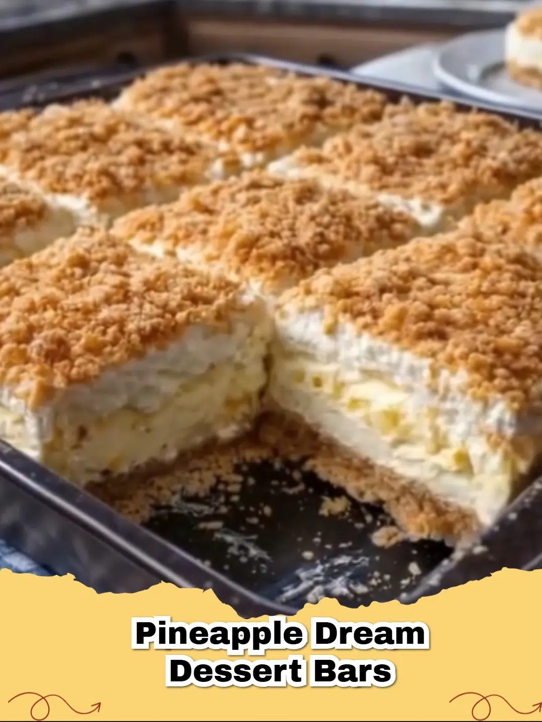 Delicious no-bake Pineapple Dream Dessert Bars in a square pan, garnished with toasted coconut.