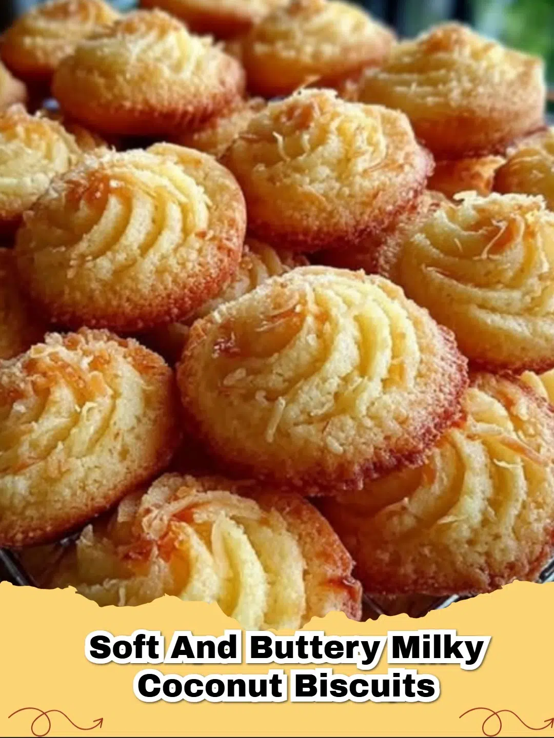 Pile of golden-brown soft and buttery milky coconut biscuits on a wire rack with tropical garnishes.