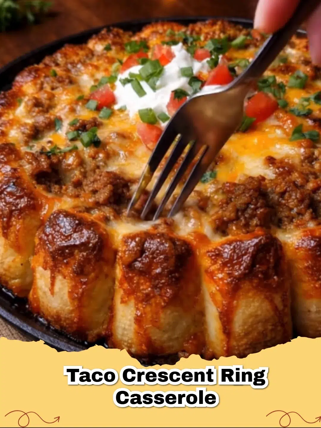 Delicious golden brown Taco Crescent Ring Casserole with melted cheese and fresh toppings, ready to serve.